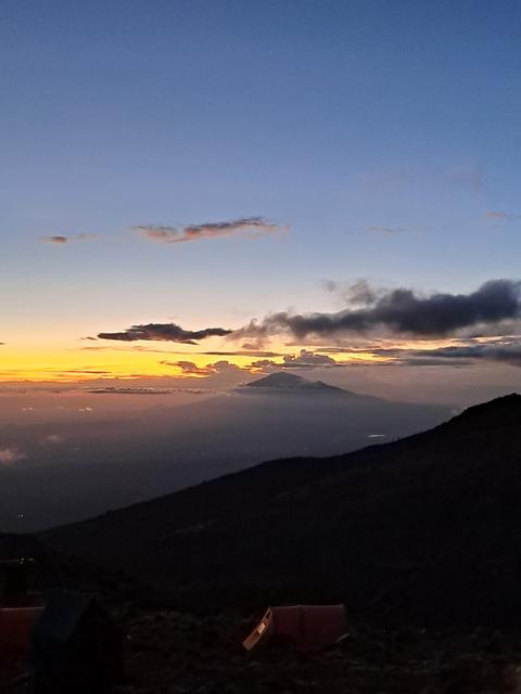 Beautiful sunset over Kilimanjaro with the summit in the background, part of a Kilimanjaro Joy Travel experience.