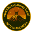 Logo of Kilimanjaro Joy Travel showing a drawn Kilimanjaro mountain with two climbers on the summit and the slogan "One Team One Dream"